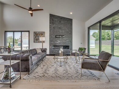 Floor to ceiling fireplace , large picturesque win