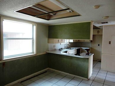 Exterior Front. Dining and kitchen