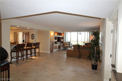 Spacious living room area, diagonal tile throughou