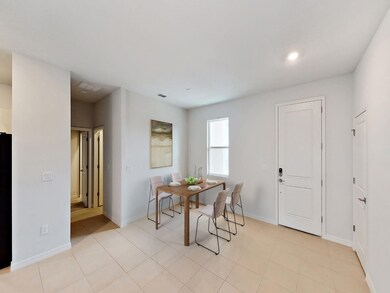 004.1_virtual staged foyer dining rm