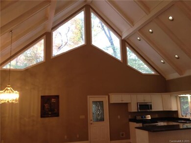Cathedral ceilings with beams in open great room