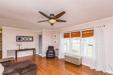 FAMILY ROOM W/ HW FLOORS, CEILING FAN, CROWN