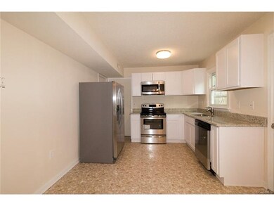 Galley Style Kitchen with new SS appliances and Granite counter-tops