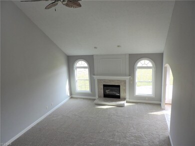 Great Room with vaulted ceiling and gas fireplace