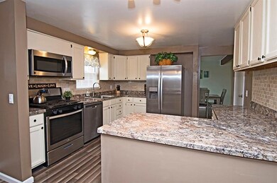 With the Breakfast Room on one Side- and the Dinin