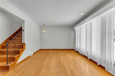 Spare room with light wood-type flooring