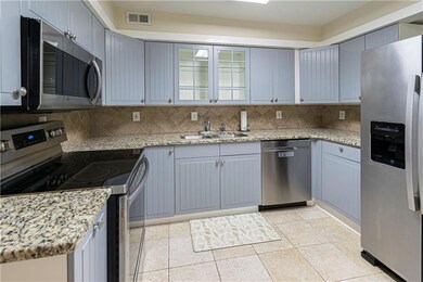 Update with granite tops, stainless steel appliances, tile flooring.