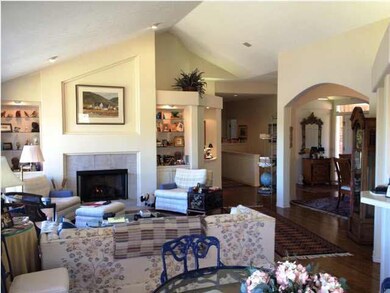 Large, open vaulted great room plan features a woo