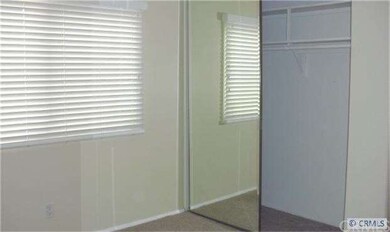 all the bedroom with mirrored closet door