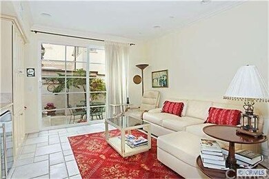 Den and kitchen are one area with wet bar, wine co