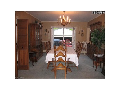 Formal dining room off the kitchen, living and fam
