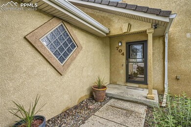 Welcome to this stunning 2-story residence nestled in the serene town of Fountain, CO