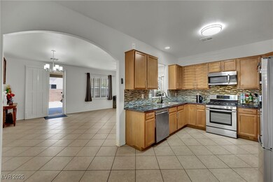 Kitchen featuring stainless steel appliances, a ch