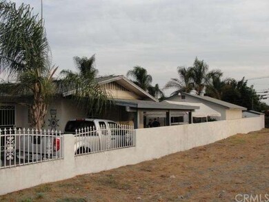 Extra long lot with block wall and wrought iron