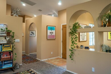 Living Rm View to Front Door to Hallway