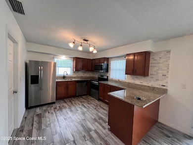 5381 Frederick Ave, Melbourne, FL 32904 - photo 3