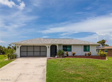 Single story home featuring stucco siding, a garag