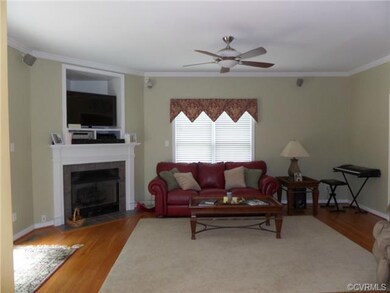 19 x 14 Family Room with Hardwood Floors and gas f