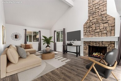 West-facing living room with views of the front range and Cherry Creek State Park