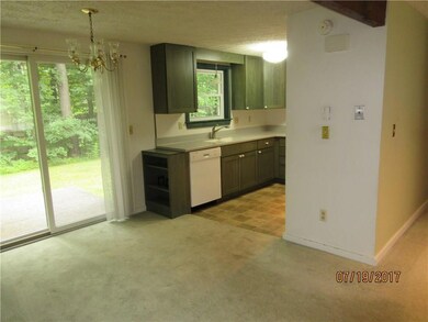 Dining area with slider to back patio.