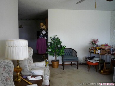 Living room looking into dining area