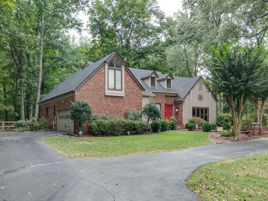 View of front of property with a garage and a fron