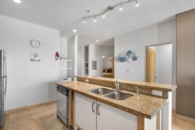 The sink and dishwasher are located in the Island.