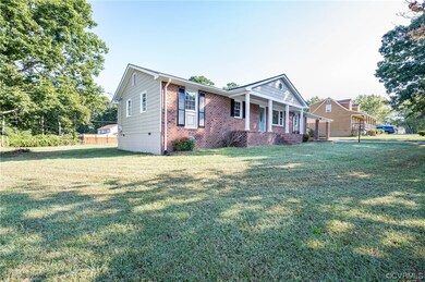 View of front of property with a front yard