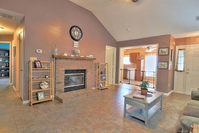 Brick fireplace in family room.