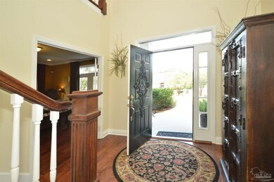 hardwood floors, 2 story foyer, living room to R