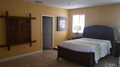 Master bedroom with customized walk in closet and 