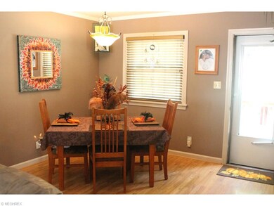 Dining area flows into living room (notice back of