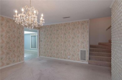 Lovely formal dining room off the atrium room with