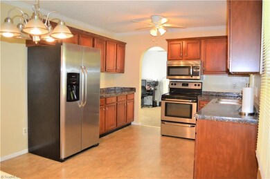 Bright open kitchen that leads to the family room. Stainless steel appliances. Crown molding, nice storage in cabinets!
