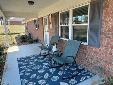 View of patio featuring a porch