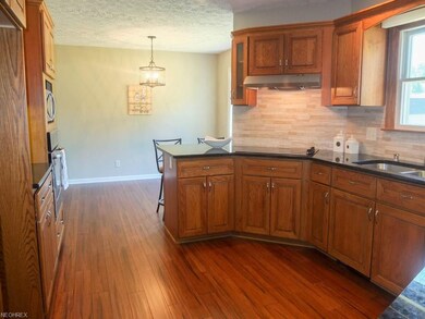 Stunning kitchen with granite countertops and tile