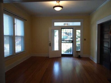 Opposite view of the livng room; pocket doors to t