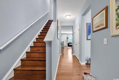 Staircase with wood-type flooring