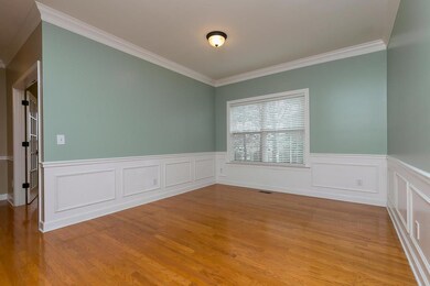 Formal dining room...just off the entrance foyer....