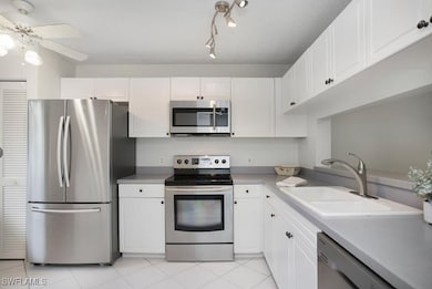 Kitchen featuring a sink, appliances with stainles