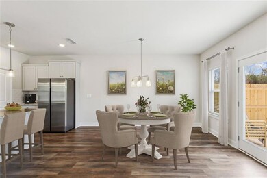 Dining area featuring dark hardwood / wood-style f