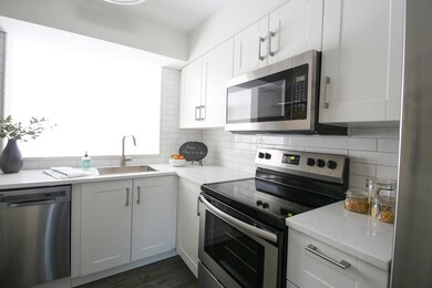 CONDO KITCHEN WITH STAINLESS APPLIANCES