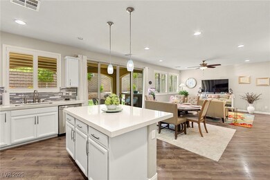 Kitchen with a sink, dishwasher, a ceiling fan, wh