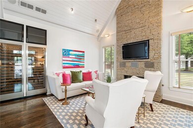 Living room featuring plenty of natural light, bas