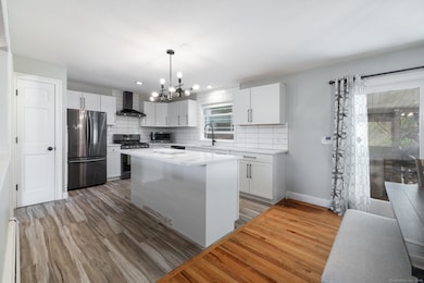 The kitchen is completely open to the dining room 