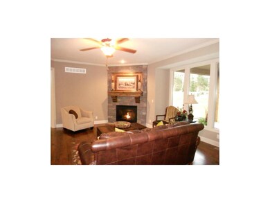 Light & Bright Great Room with hardwood floors.