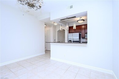 Kitchen with pendant lighting, stainless steel fri