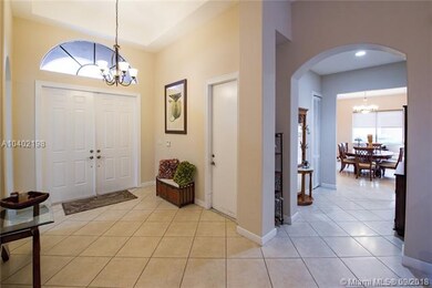 Foyer entrance - view showing entrance to garage -