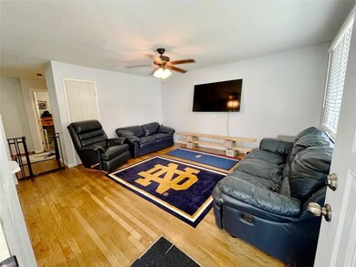 Living room of south unit with refinished floors