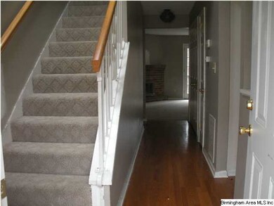 Entry with hardwood floors